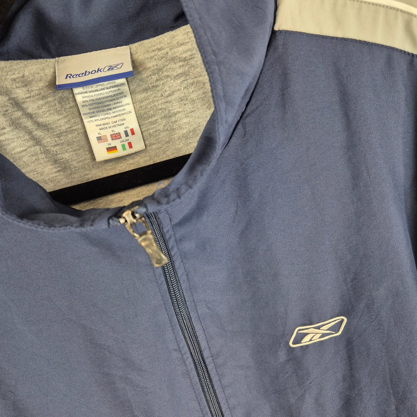 Vintage Reebok 2000's Dark Blue Spray Jacket Size XL